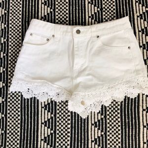 White denim shorts with knit details on ends